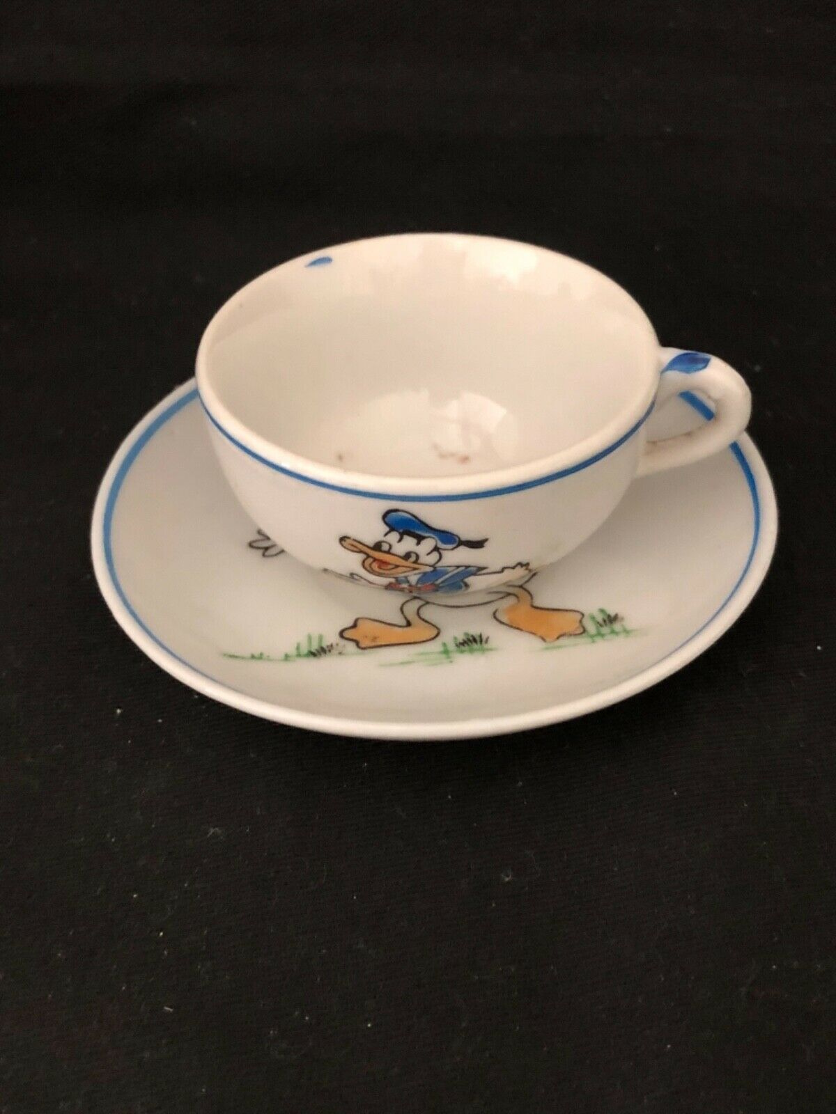 VINTAGE DONALD DUCK CHILDREN’S SMALL CUP AND SAUCER
