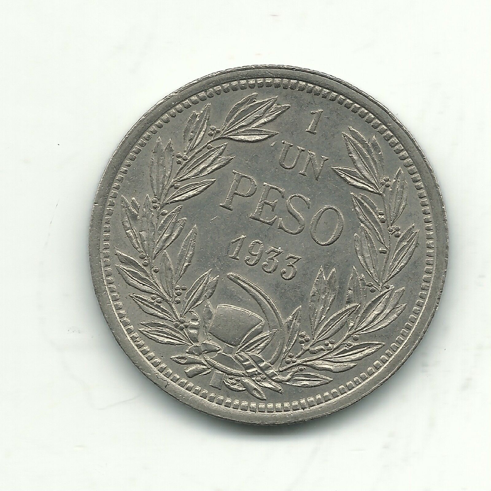 HIGH GRADE AU 1933 CHILE ONE PESO - DEFIANT CONDOR ON ROCK-OCT482
